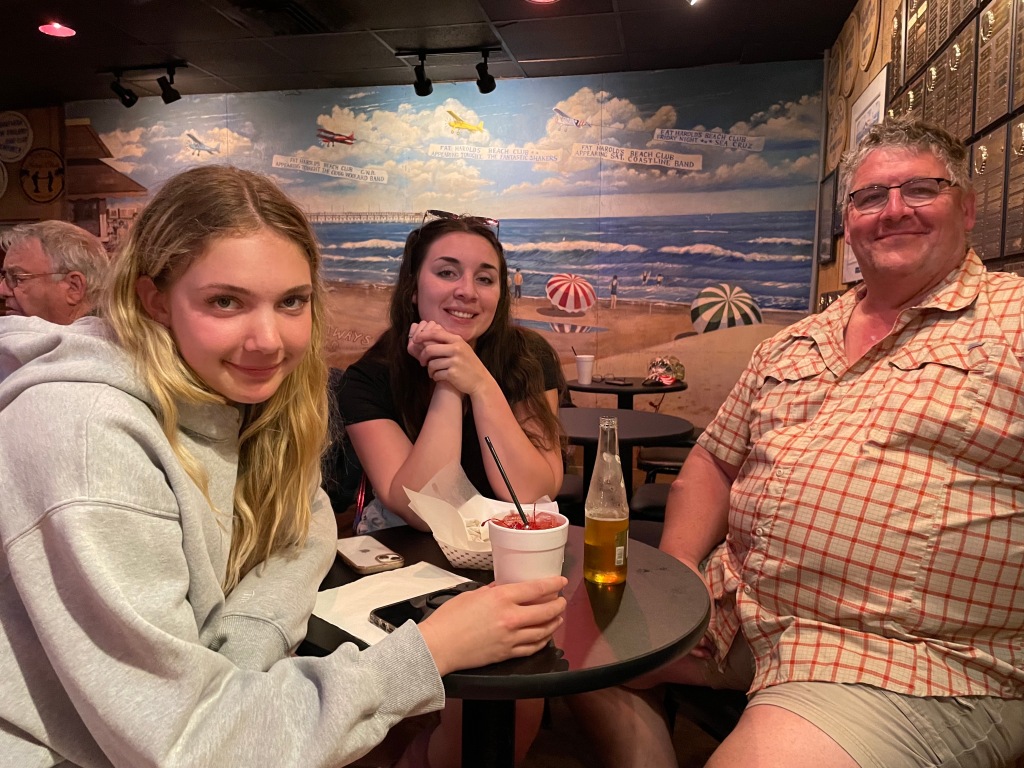My family at Fat Harold's with a beautiful beach mural in the background